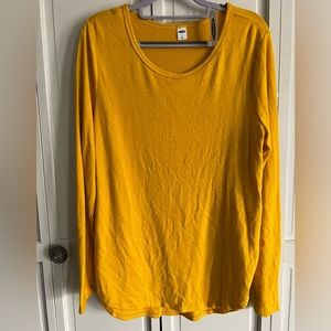 Yellow women’s long sleeve top.